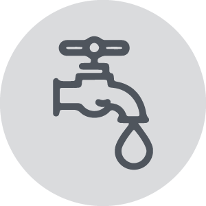 Icon for a faucet with water dripping on a gray circle