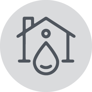 Icon for a house with a water drop on it on a gray circle