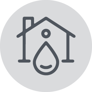 Icon for a house with a water drop on it on a gray circle